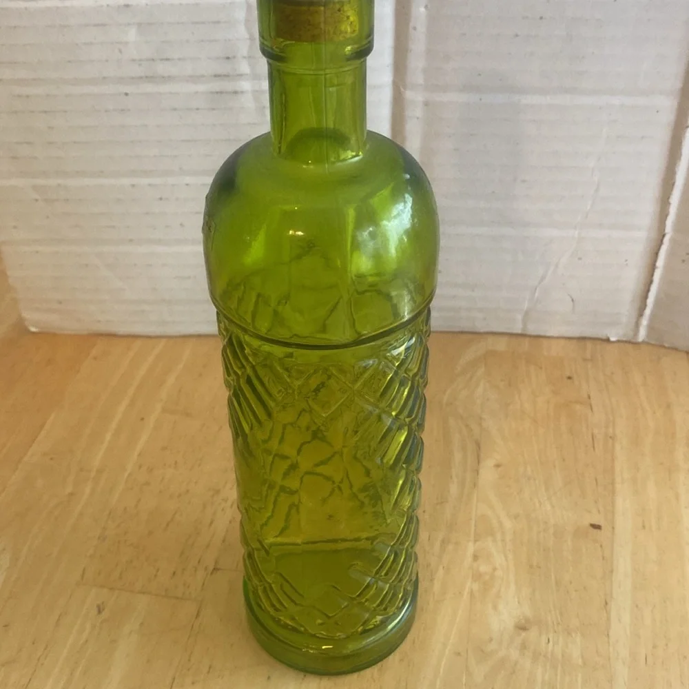 Beautiful green glass decorative or useful bottle. Made in Spain. NWOT.